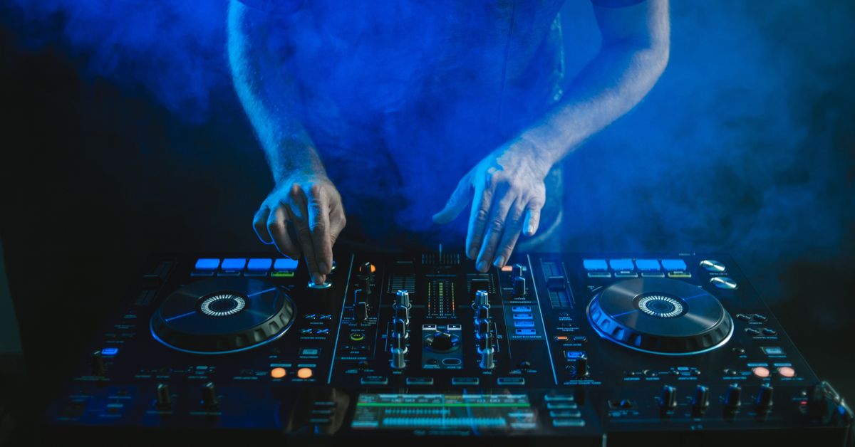 Dj mixes music