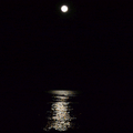 The moon plays the ocean like a violin