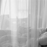 when their souls meet their bodies, wide-eyed brothers on a hotel bed dream of home