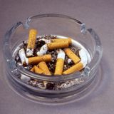 ashtrays on the table, a mix of 70's grease
