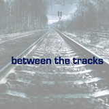 between the tracks
