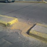 MÓVIL 93.5; DR. GHIO ESQ. AV. SAN MARTÍN, POZO EN EL CUAL HOY SE CAYO UNA SEÑORA MAYOR