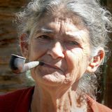 Lay at bed and smoke a pipe