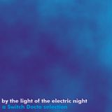 by the light of the electric night