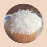 Coconut Cupcakes with Seven-Minute Frosting and Coconut Flakes