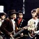 (Allen Ginsberg+McCartney+Philip Glass)+(Roy Orbison+Dylan+George Harrison+Tom Petty)+Máximo Damián= logo
